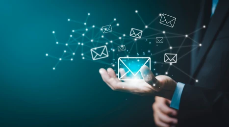 A hand holds a smartphone displaying a screen with a customer support option. The screen features two distinct buttons for initiating chat support: one blue button labeled 'iMessage' and one green button labeled 'WhatsApp'. Text above the buttons reads 'Chat with us' followed by a description of the support options. A 'Dismiss' option is also present at the bottom.